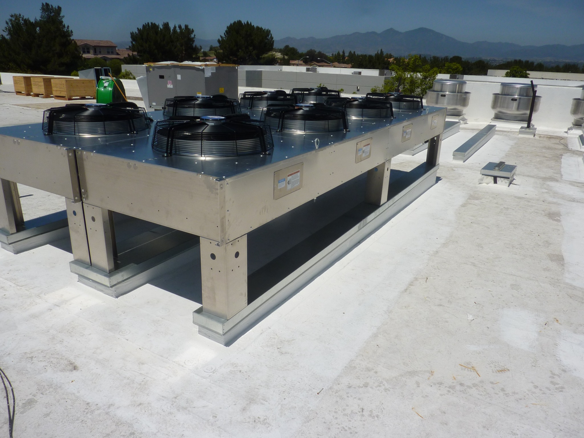 Rooftop mechanical equipment adding loads to roof framing